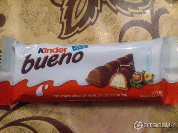 Вафли Kinder bueno покрытые молочным шоколадом с молочно-ореховой начинкой фото