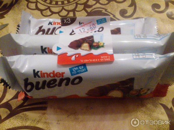 Вафли Kinder bueno покрытые молочным шоколадом с молочно-ореховой начинкой фото