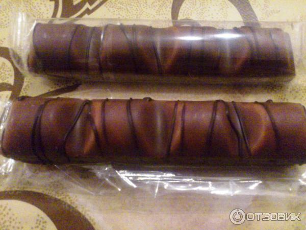 Вафли Kinder bueno покрытые молочным шоколадом с молочно-ореховой начинкой фото