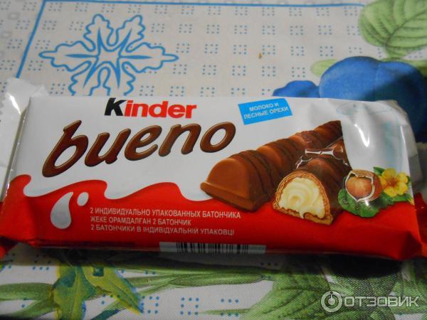 Вафли Kinder bueno покрытые молочным шоколадом с молочно-ореховой начинкой фото