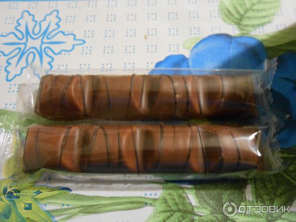 Вафли Kinder bueno покрытые молочным шоколадом с молочно-ореховой начинкой фото