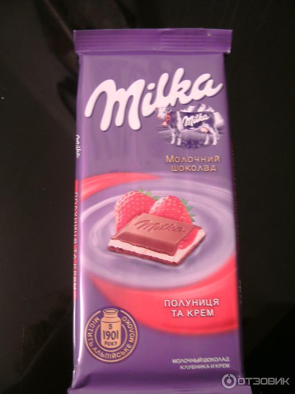 Шоколад молочный Milka с двухслойной начинкой Клубника со сливками фото