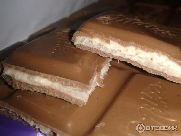 Шоколад молочный Milka с двухслойной начинкой Клубника со сливками фото