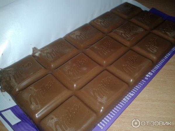 Шоколад молочный Milka с двухслойной начинкой Клубника со сливками фото