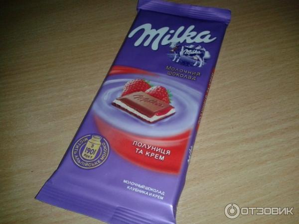 Шоколад молочный Milka с двухслойной начинкой Клубника со сливками фото