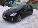 Автомобиль Toyota Prius - хэтчбек фото