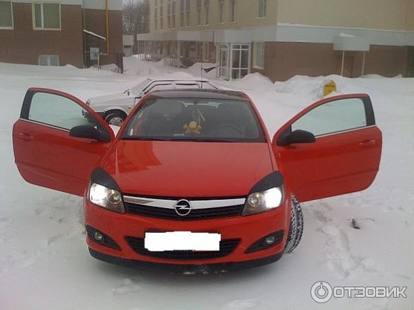 Автомобиль Opel Astra хэтчбэк фото