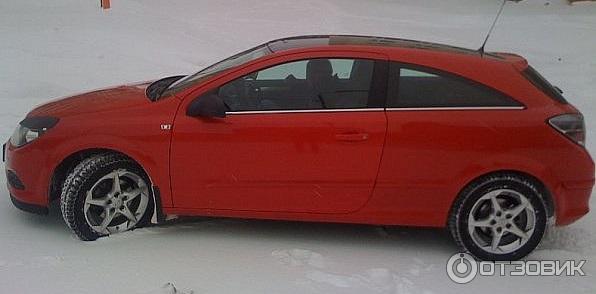 Автомобиль Opel Astra хэтчбэк фото
