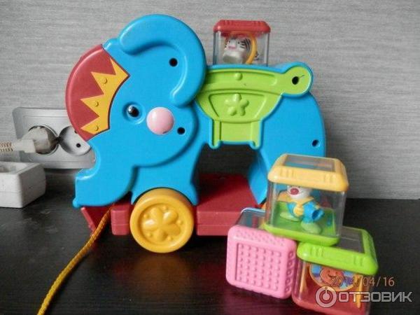 Слоник-каталка Fisher Price фото