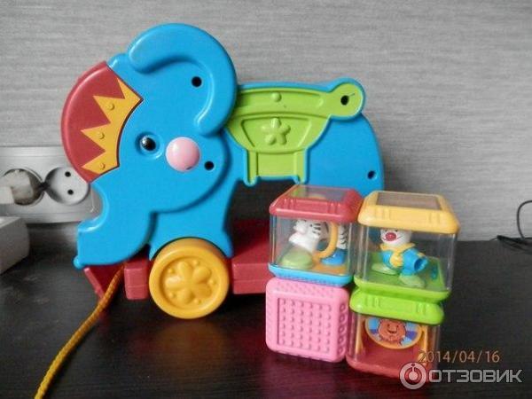 Слоник-каталка Fisher Price фото