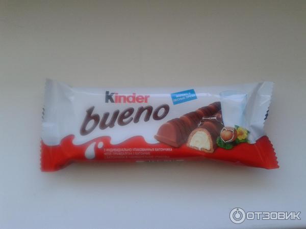 Вафли Kinder bueno покрытые молочным шоколадом с молочно-ореховой начинкой фото