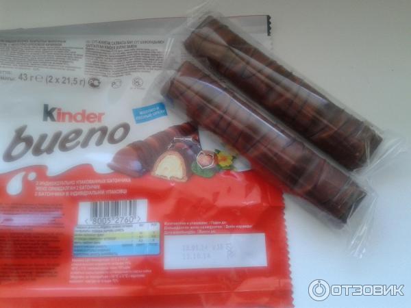 Вафли Kinder bueno покрытые молочным шоколадом с молочно-ореховой начинкой фото