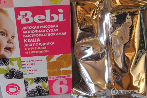 Детская рисовая молочная каша Bebi для полдника с печеньем и ежевикой фото