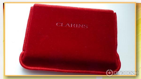 Компактная устойчивая тональная крем-пудра Clarins фото