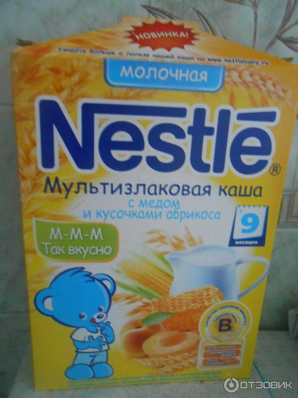 Каша молочная Nestle Мультизлаковая с медом и кусочками абрикоса фото