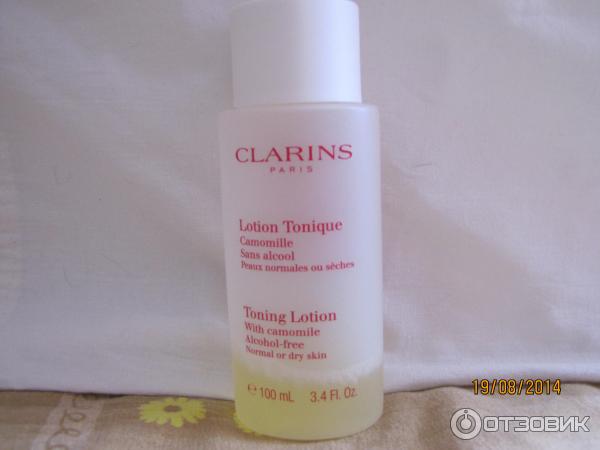 Тонизирующий лосьон Clarins с ромашкой для сухой и нормальной кожи фото