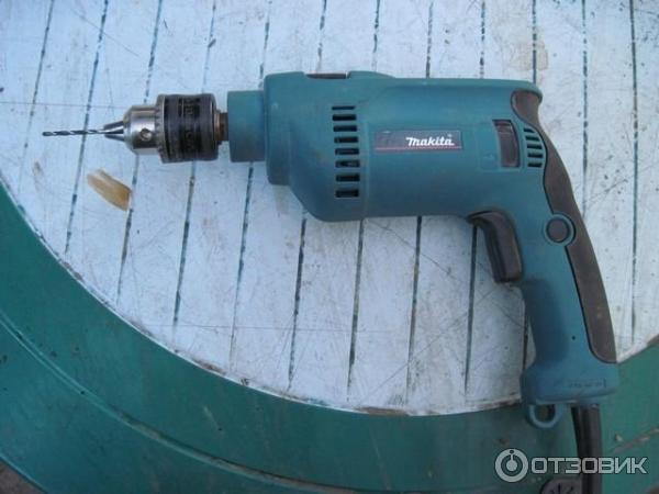 Электродрель Makita HP 1620 фото