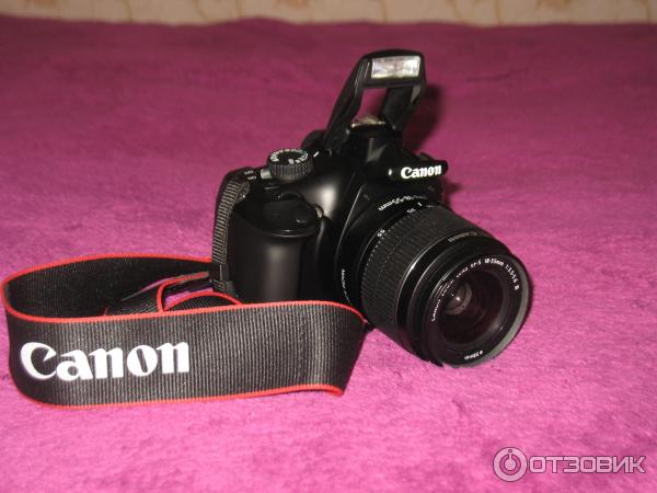 Цифровой зеркальный фотоаппарат Canon EOS 1100D Kit EF-S 18-55mm DCIII