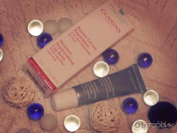 Бальзам для губ Clarins Moisture Replenishing Lip Balm фото