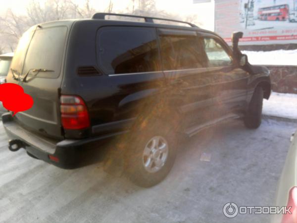 Автомобиль Toyota Land Cruiser 105 внедорожник фото